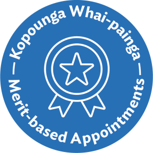 Blue circular icon with a ribbon badge symbol. The text ‘Kopounga Whai-painga’ is above the symbol and ‘Merit-based Appointments’ below.