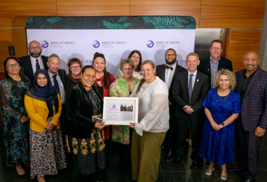 Some of the Regional Public Service Commissioners standing with their Spirit of Service Award