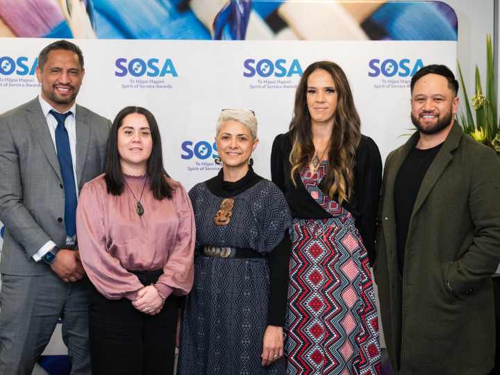 ACC team standing side-by-side and smiling at the camera