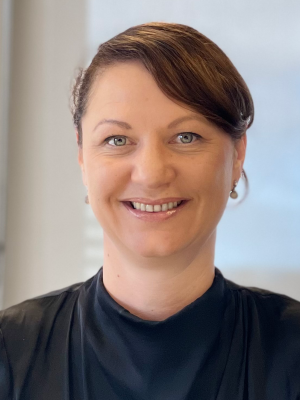 Heather Baggott looking at the camera and smiling