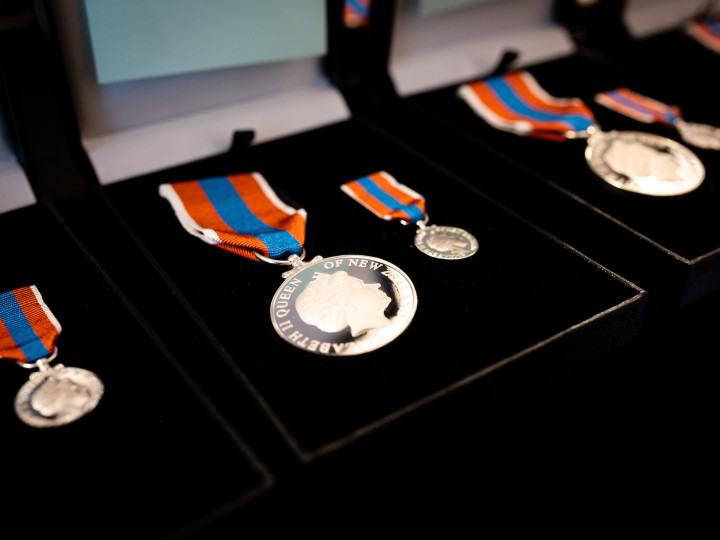 The New Zealand Public Service Medal in a display case