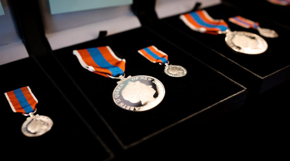 The New Zealand Public Service Medal in a display case